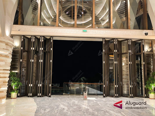 Commercial Elegance: Our Aluminum Folding Doors Enhance Hotel Entrances